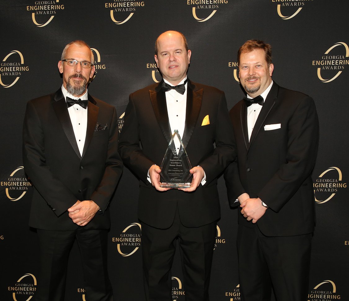 Accepting the award (left to right) were Tom Karis, Chris Edmondson and Kevin Kahle.